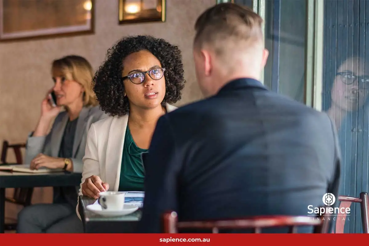 mixed race couple taking in cafe