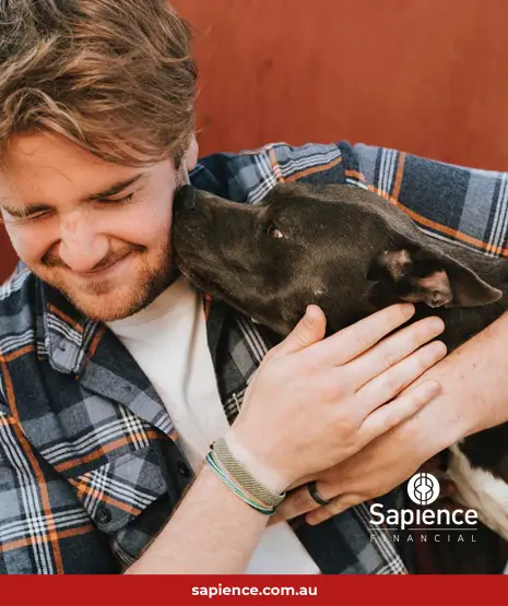 teenager and dog playing