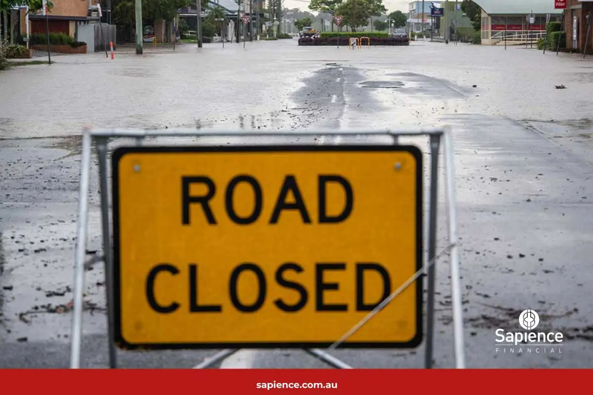 Road closed during heavy rain road sign