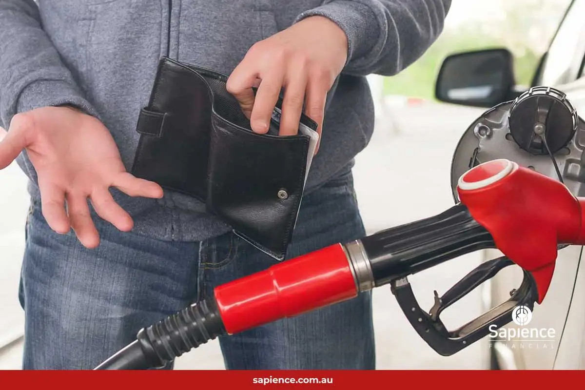 person standing at petrol bowser