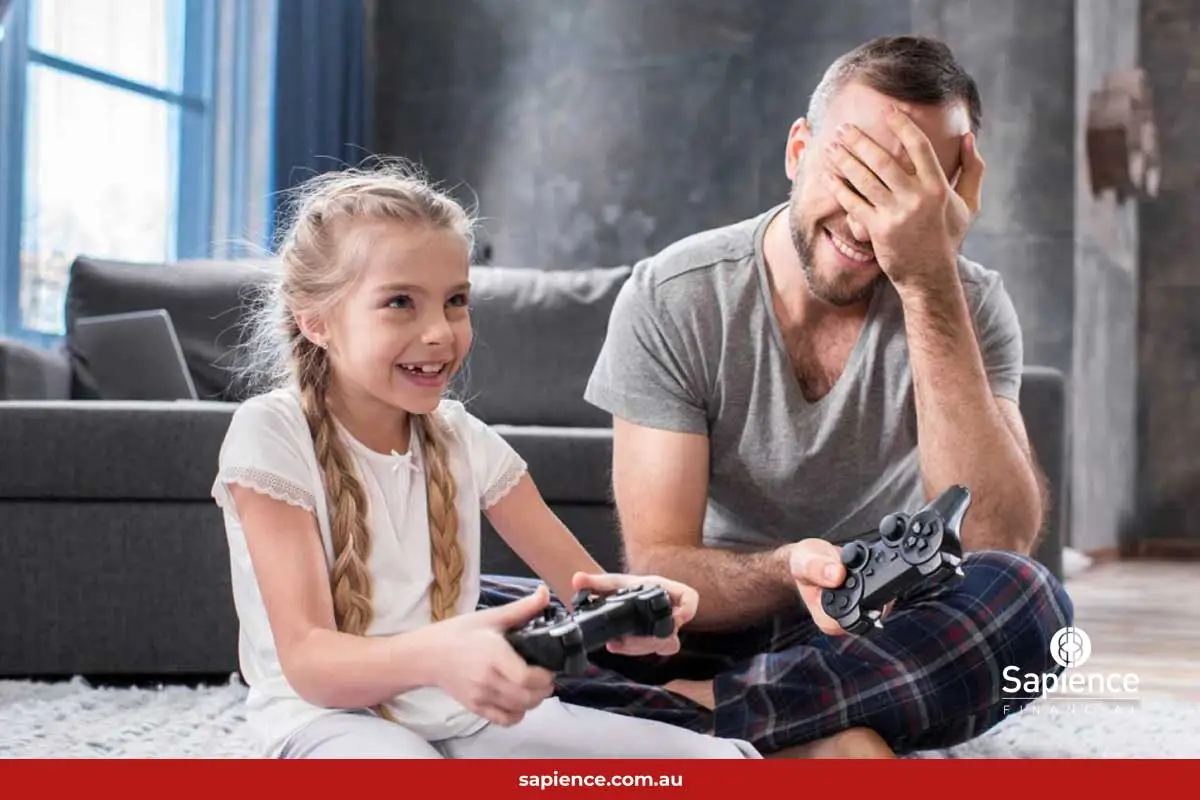 daughter beating father while they play console games together games
