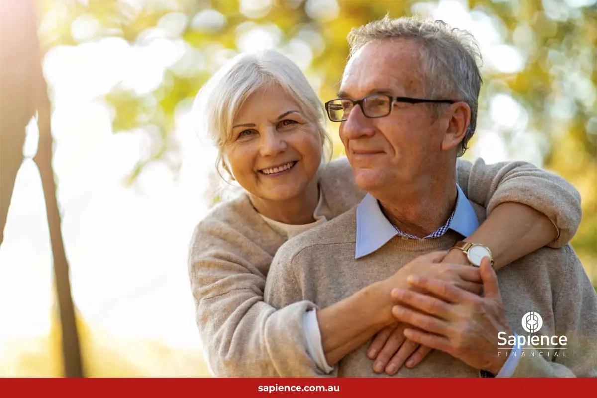 smiling and affectionate older couple in spring time
